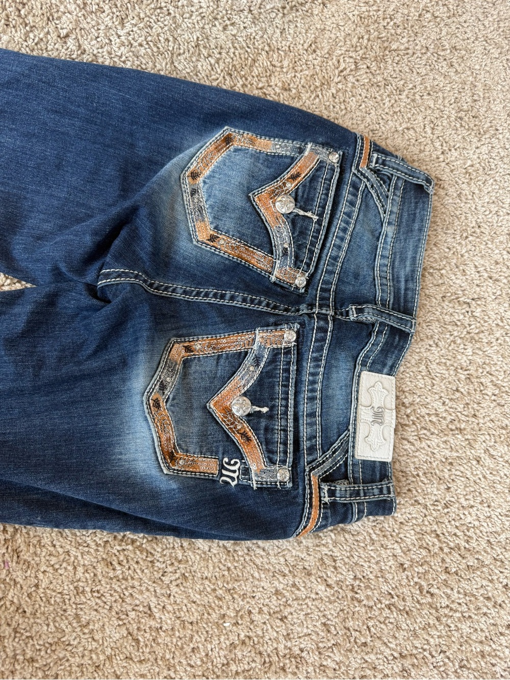 Miss Me 26 blue midrise bootcut jeans with brown sequin accents